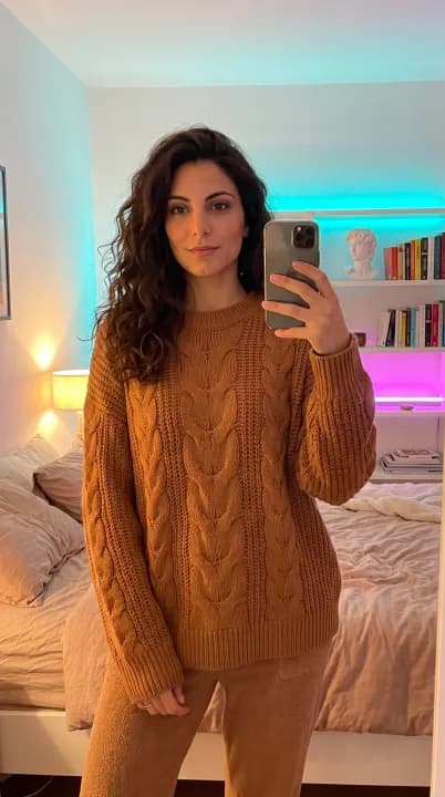 A shopper taking a night selfie to use as their try-on reference