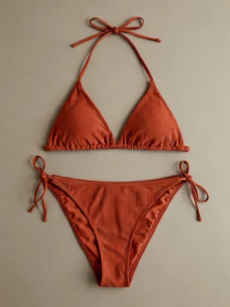 A terracotta bikini from a store catalogue, photographed on its own